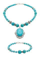 Collana e bracciale in grani di turchese, con pendente ovale a cabochon