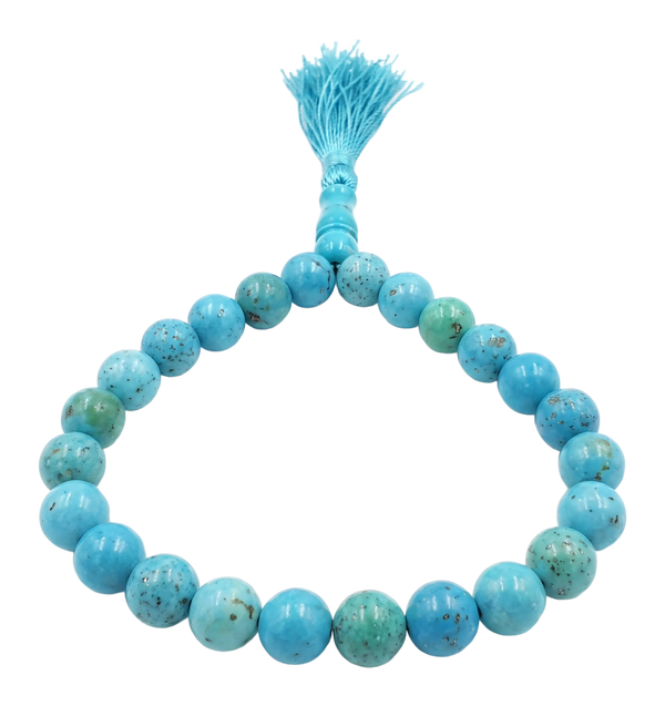 Tasbih di grani tondi in turchese con nappa azzurra e cartoncino di certificazione